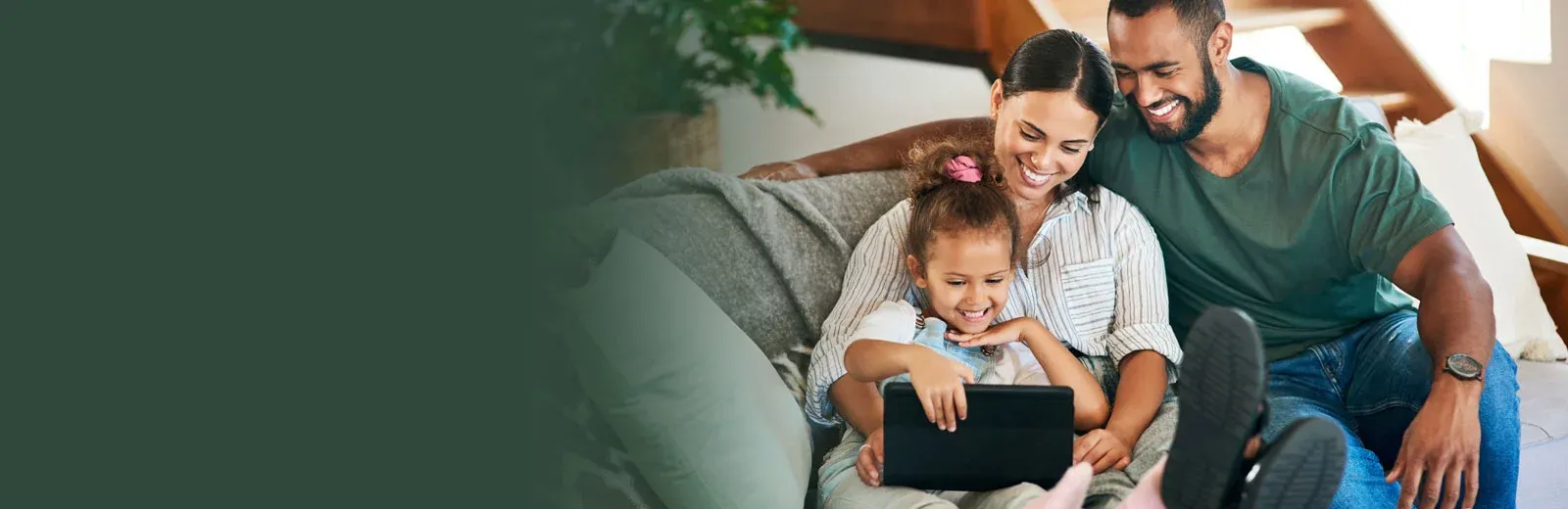 Family laughing in pest free living room